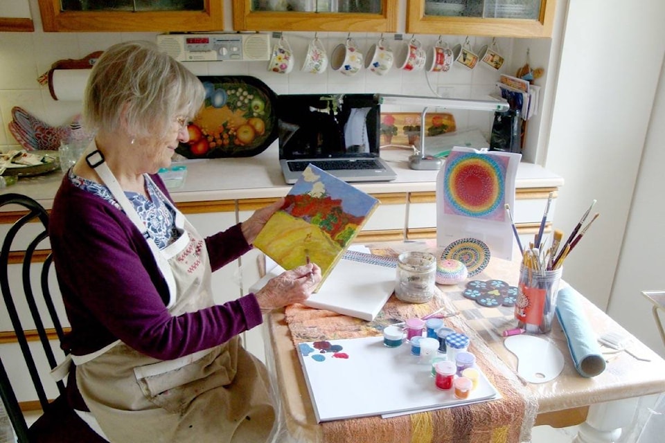 White Rock’s Joan Bywater shows the setup she uses when participating in online paint parties hosted by the Seniors Come Share Society. (Contributed photo)
