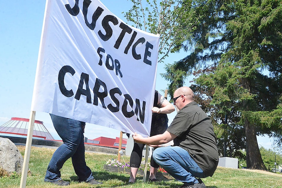 26515938_web1_210702-LAT-JusticeForCarson