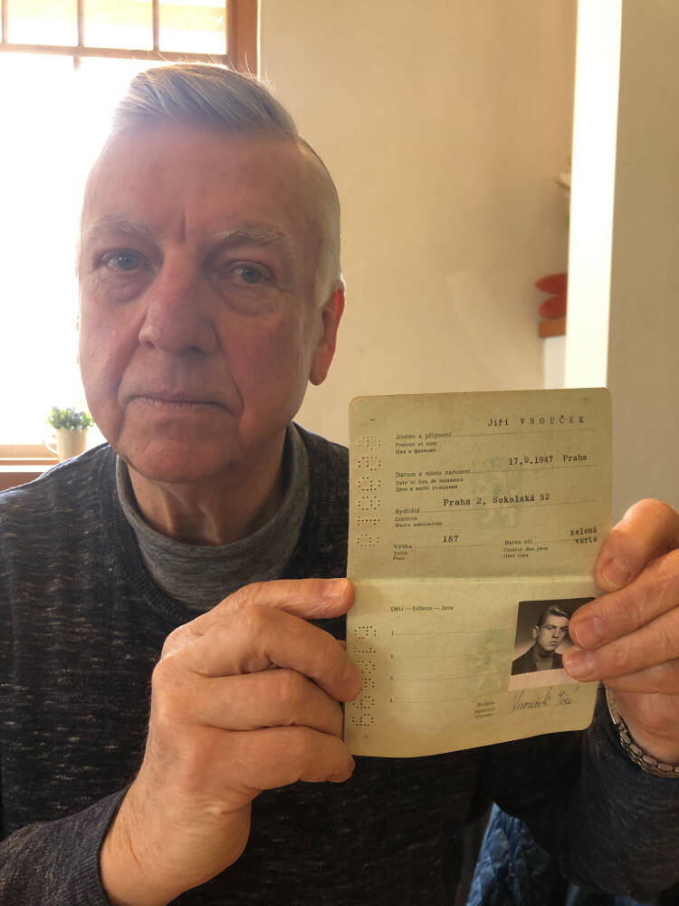 George Vnoucek shows off the Czechoslovakian passport he used to escape the country after it was invaded by Soviet Union countries in 1968. The passport shows his Czech name Jiri, which he was advised to change during immigration. Photo: Tyler Harper