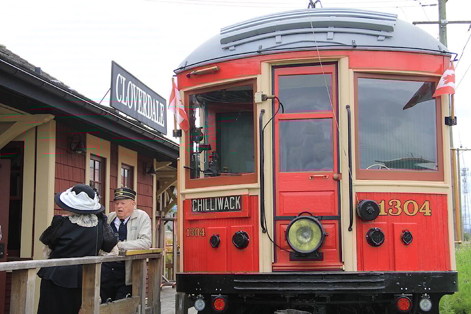 Fraser Valley Heritage Rail Society volunteers stand on the train platform in Cloverdale. Surrey’s heritage rail experience is set to restart its runs to Sullivan Station Sept. 8. (Photo: Malin Jordan)
