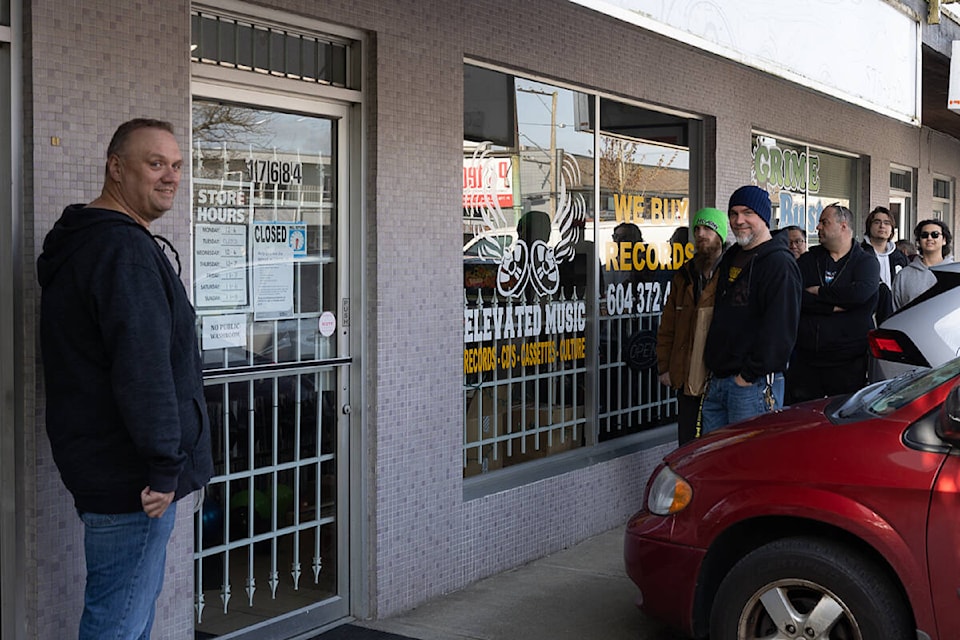 Customers line up outside Cloverdale’s Elevated Music April 23 on Record Store Day, a worldwide sales day focusing on record stores. Many new records and limited-edition pressings are released exclusively on Record Store Day, making the sales day an eagerly anticipated event. (Photo: Jason Sveinson)