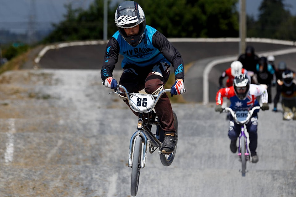 Holden Dipiazza races down the track during the Action BMX Western Series Weekend in Surrey on Saturday, July 30, 2022. The rider with the most points at the end of the weekend will walk away with a red jacket. (Photo: Anna Burns/Surrey Now-Leader)