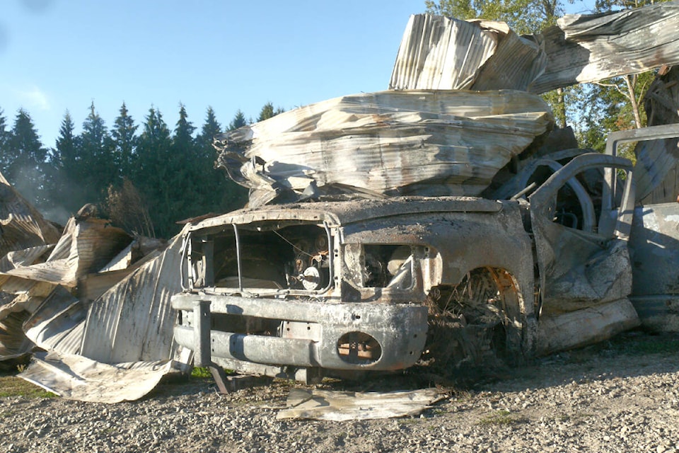 Fire completely destroyed several large farm buildings on 244th Street near 50th Avenue on Sunday, Aug. 28. (Dan Ferguson/Langley Advance Times)