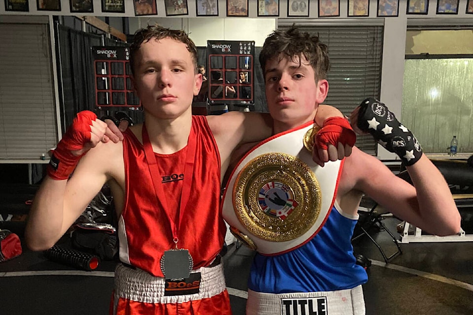 Clayton Heights’ Saul Aspinall (left) and Chilliwack’s Sonny Meredith fought for the provincial gold medal in the Junior C, 125-pound weight class Nov. 27. The two fighters are also best friends. (Photo submitted: Dale Gatin)