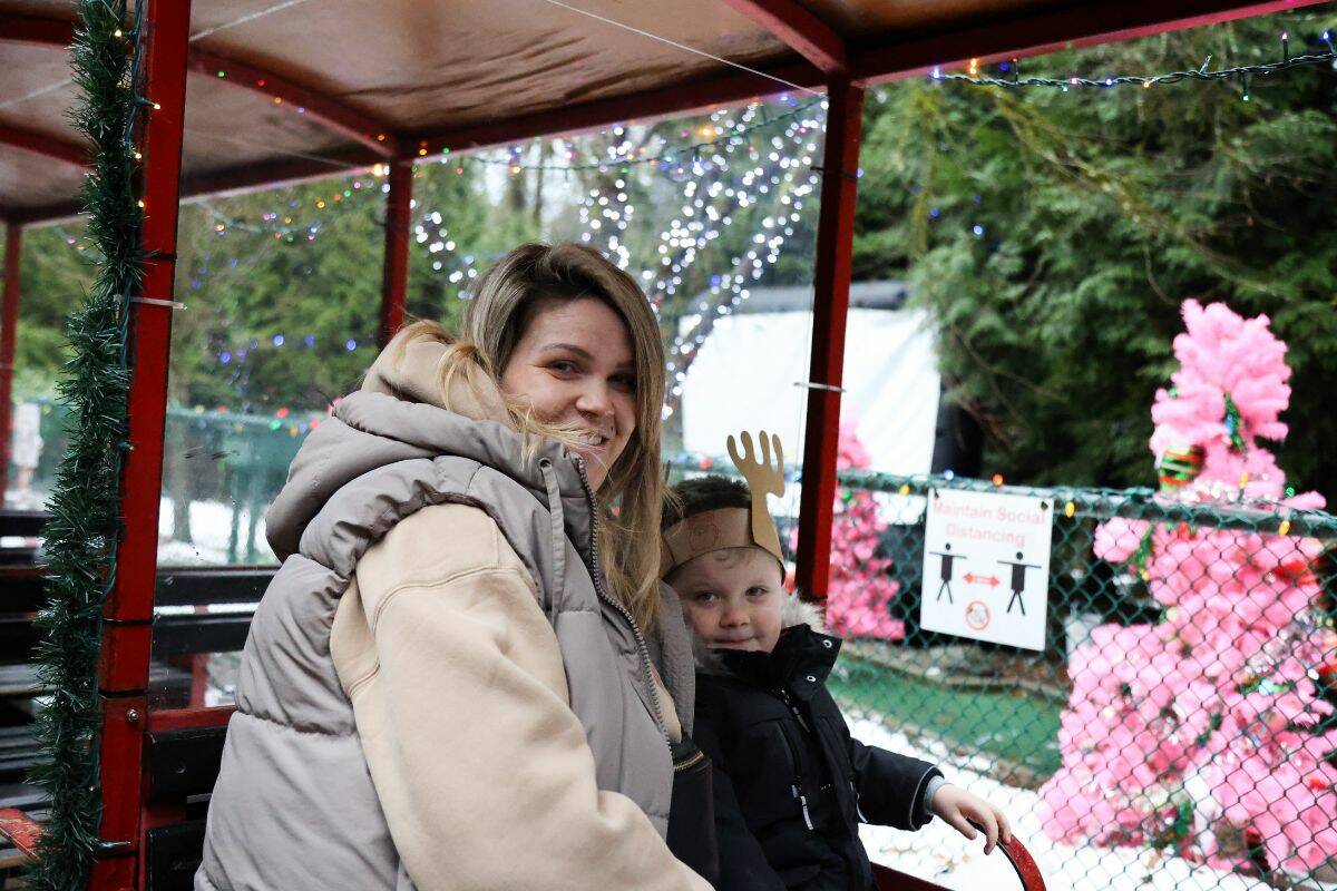 Celena Arthur and Grayson Arthur, 5, on the Christmas Train at Bear Creek Park in Surrey on Saturday, Dec. 10, 2022.(Photo: Anna Burns)