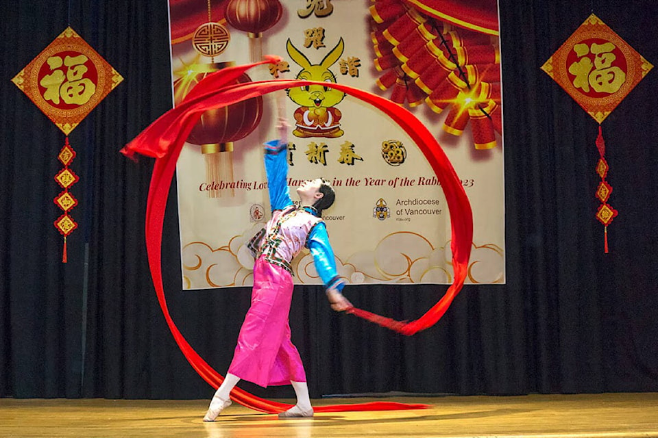 A woman performs a traditional Chinese dance routine during Precious Blood church’s Lunar New Year Festival Jan. 28. (Photo submitted: Mable Ho)