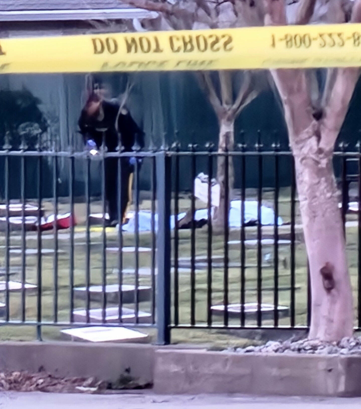 An RCMP officer in Vedder View Gardens cemetery in Chilliwack after 8 p.m. on April 1, 2023 at the scene of an apparent shooting, the third in the area in eight days. (Submitted photo by anonymous)