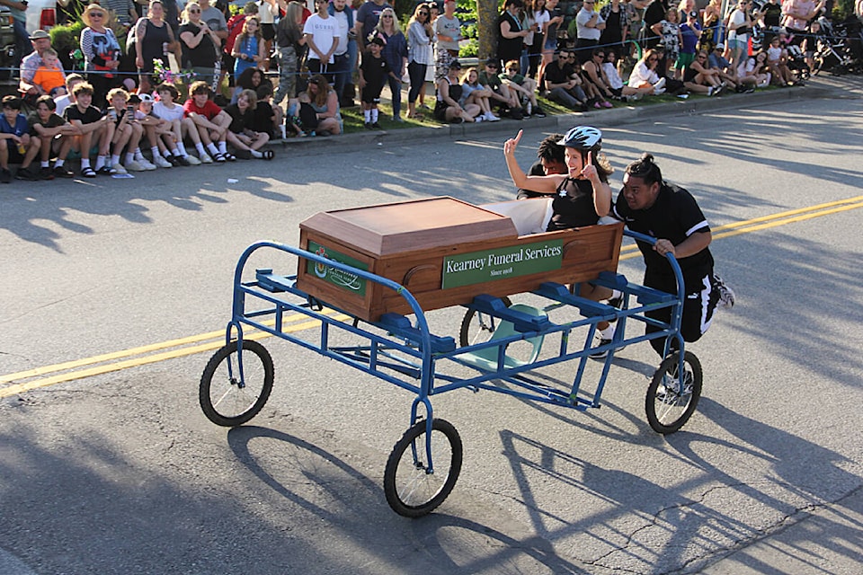 Nina Garisto rides in the custom-built Kearney Funeral Services coffin car during the 2023 Cloverdale Bed Races. This year's event will be held May 15. (Photo: Malin Jordan)