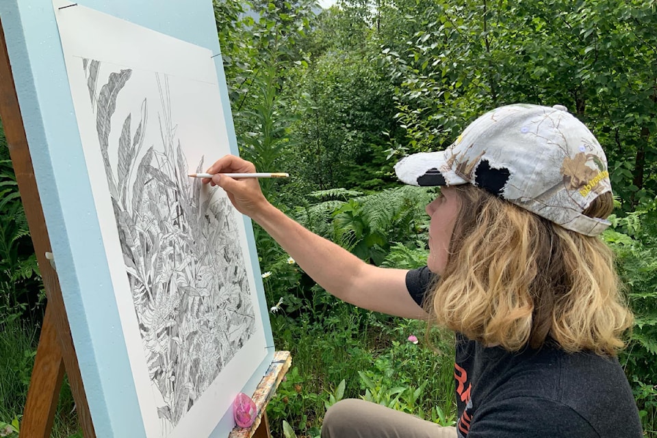 Anne Ehrlich works on one of the pieces for a solo exhibit at the Art House in the Bella Coola Valley. 
