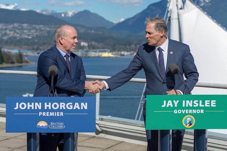 11079787_web1_20180319-BPD-Horgan-Inslee-Mar16.18-BCG