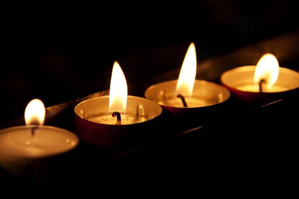 11162666_web1_180325-BPD-M-burning-candles-in-the-dark