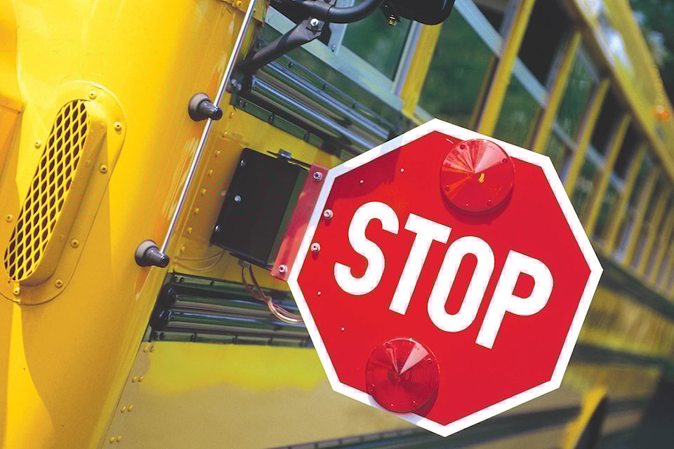 18558744_web1_School-Bus-stop-sign