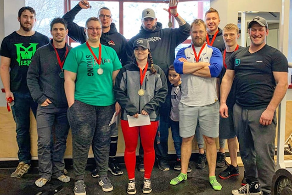 There were ten powerlifters that took part in the event including Kyle Cook (from left), Matthew Morrison, Brittany Baird, Brandon Hussey, Marina Davies, Dustin Fisher, Joe Wilburn, Landen Stasica and Jayden Nohr pictured here with event organizer Tyson Delay. (Photo submitted)