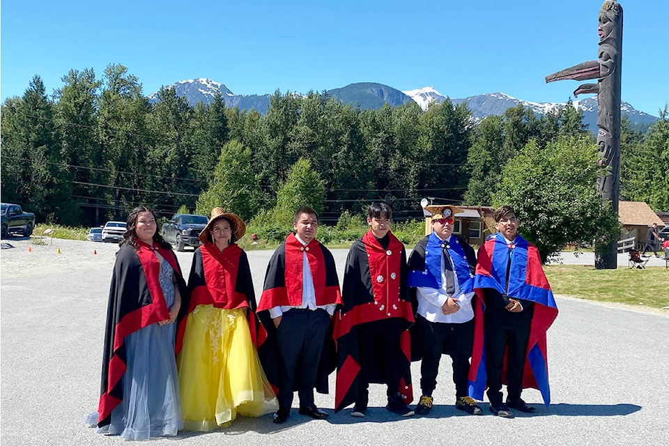 Tamara Siwallace (from left), Jade Mack, Tristan Andy, Gary Bolton, Albert Edgar and Jarome White are the 2020/2021 graduates of Acwsalcta School in Bella Coola. (Cathy Robson photo)