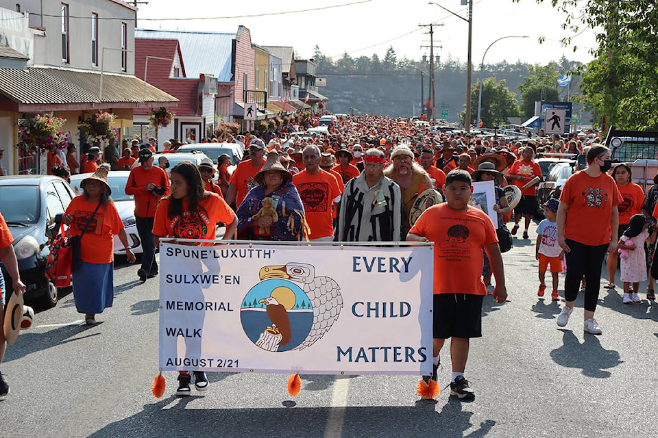 Children from Penelakut led the march up Oak Street toward Waterwheel Park. (Cole Schisler photo)