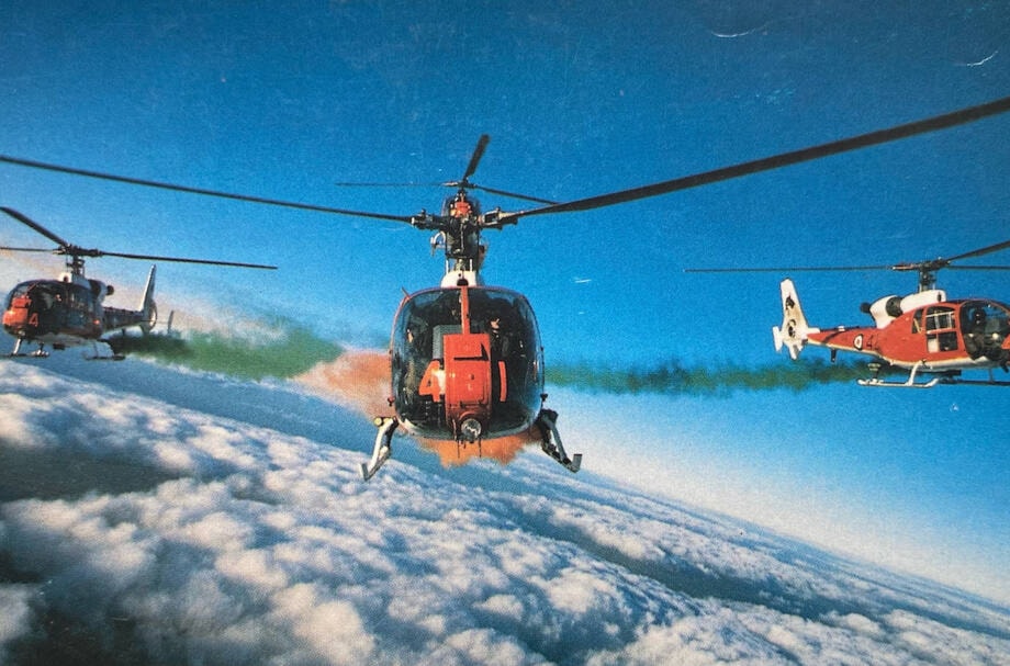 Treverton (middle) flying helicopters with the Royal Navy display team in 1988. Photo: Vince Treverton