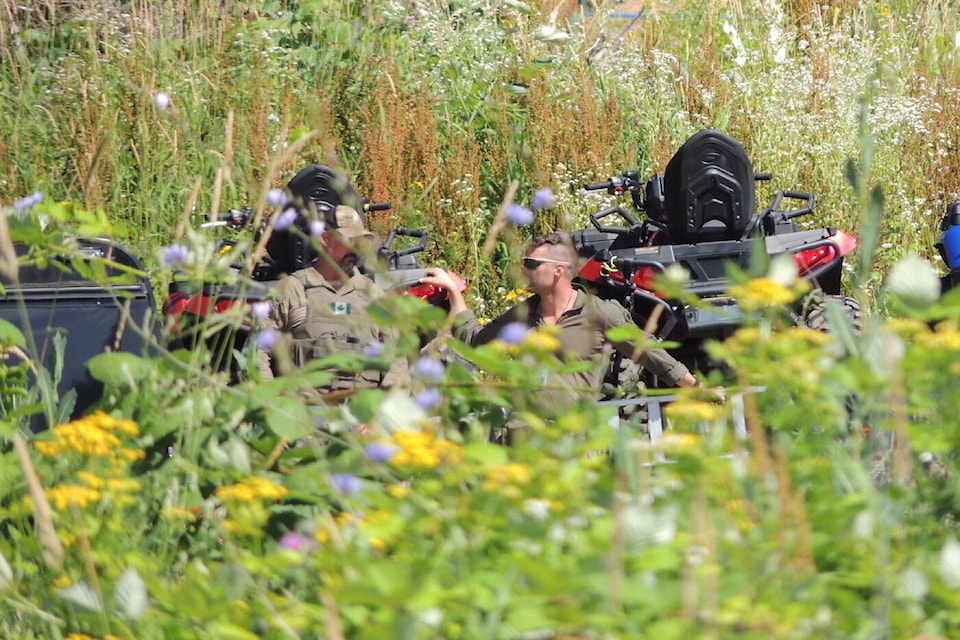 A view from the corner of Bridal Falls Road and Cheam Road where there was a heavy police presence east of Chilliwack on Friday, July 22, 2022. (Adam Louis/ Black Press Media)