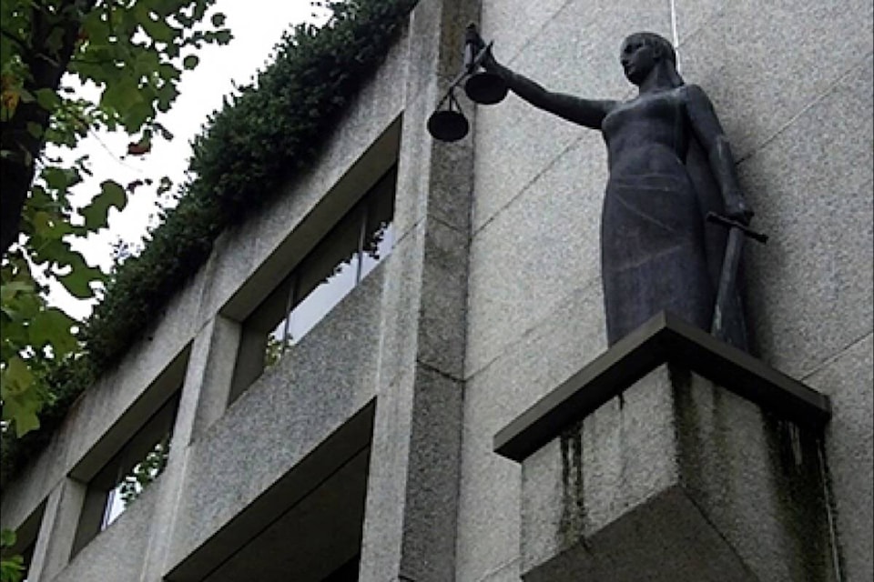 31230828_web1_221208-SUL-SryIlegalRenosCourt-statue_1