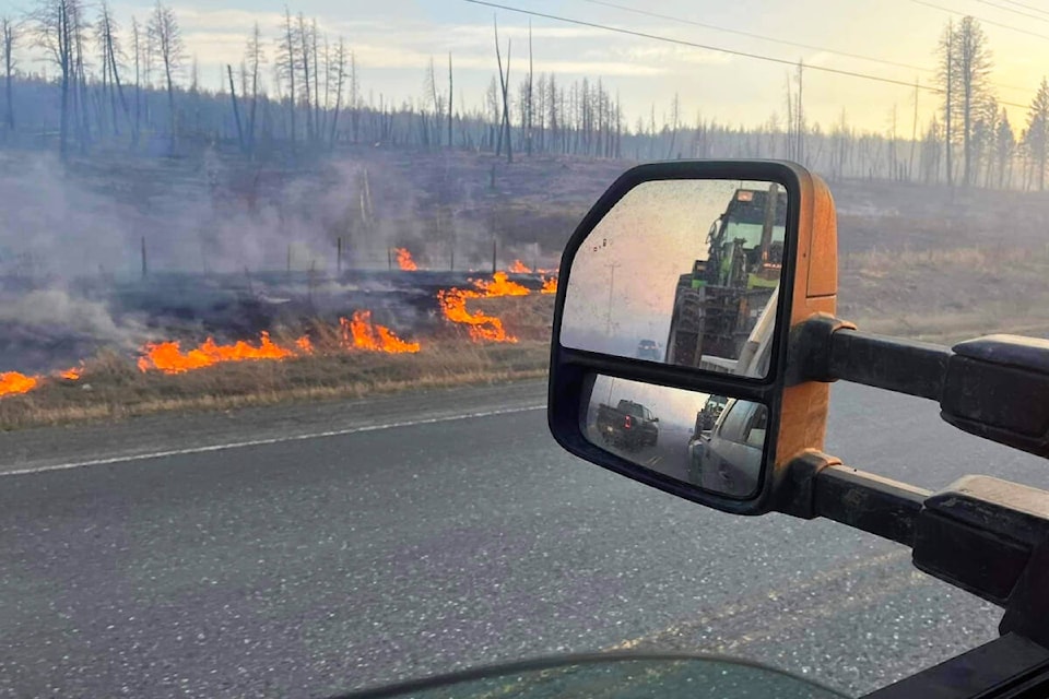 Downed power lines sparked a fire along Highway 20 April 26. (Juri Agapow photo)