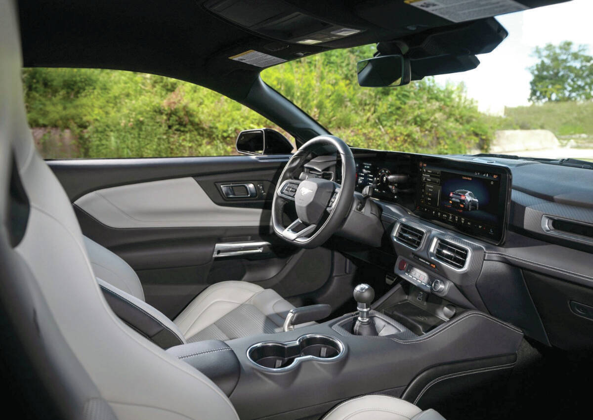 The GT gets leather-covered seats, wireless phone charging, premium sound system and 19- or optional 20-inch wheels (17-inchers come on base models) PHOTO: FORD