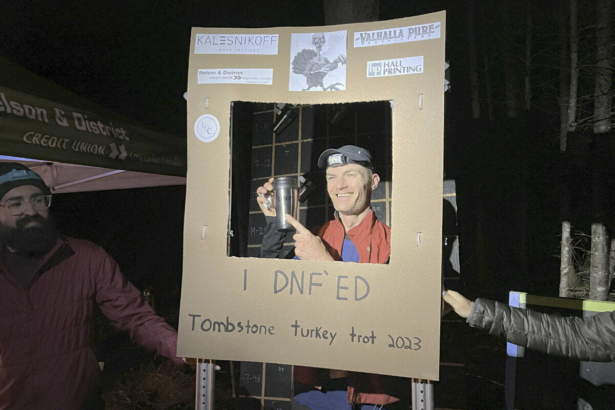 Emmanuel Malenfant poses with his DNF mug. He exited the race after running 100.5 kilometres. Photo: Tyler Harper