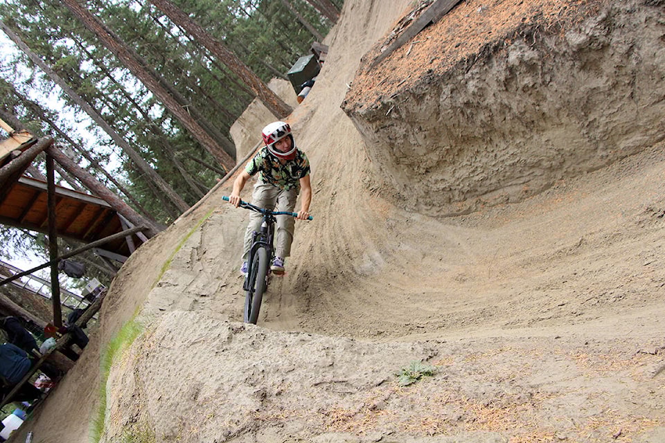 Oliver Cole tries out one of the new lines constructed at the Slopeline Bike Park in 2021. (Patrick Davies photo - 100 Mile Free Press)