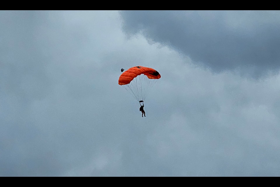 Parachuter approaches the landing area.