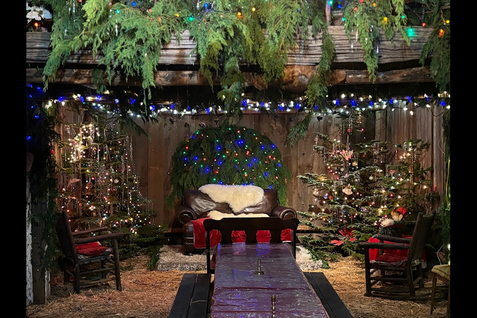 Santa’s Barn is all decked out for Woodland Gardens Christmas light display that takes place from December 1 to January 2.