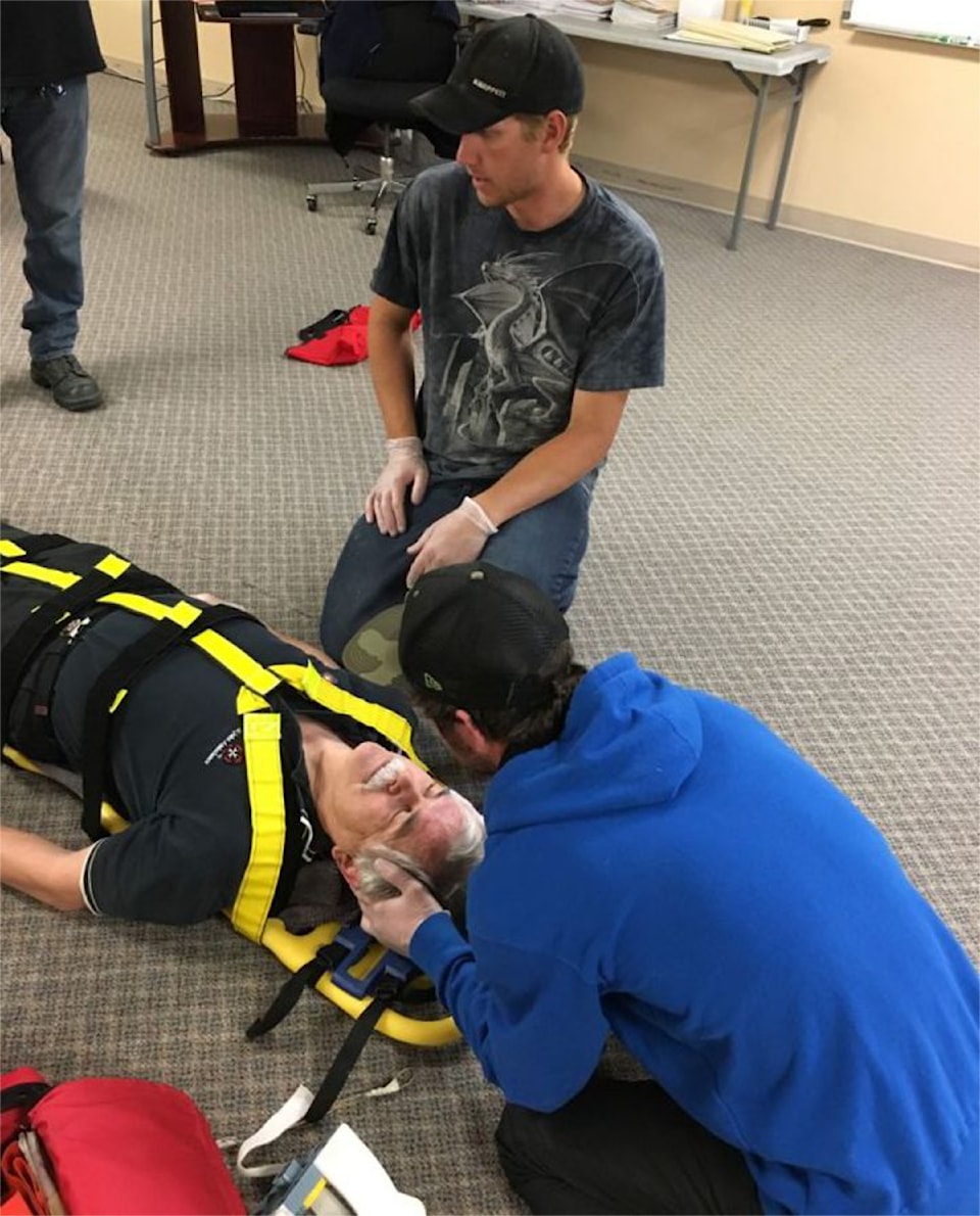 2024-08-27-st-john-ambulance-photo-of-adult-brigade-volunteers-practising-advanced-first-aid-skills