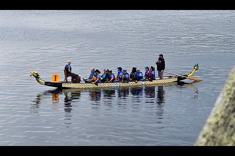 Dragon Boat moves towards the racing start.