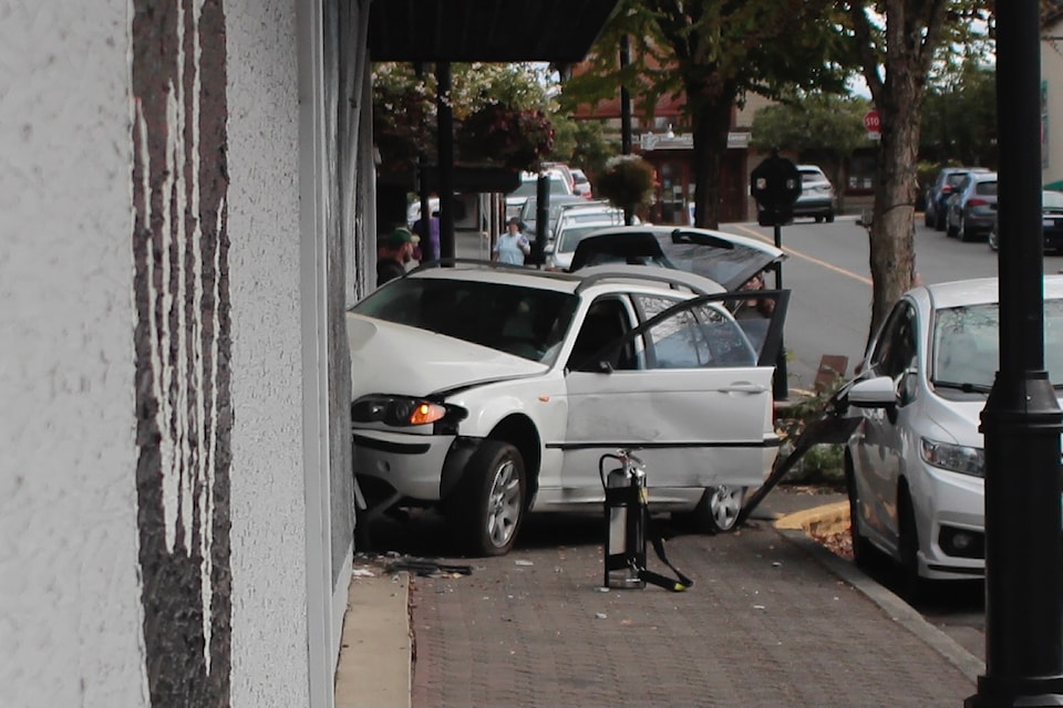 A car crashed through the wall of a downtown Courtenay business on Sept. 11.