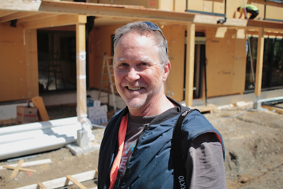 Tom Grimmer outside the passive home. 