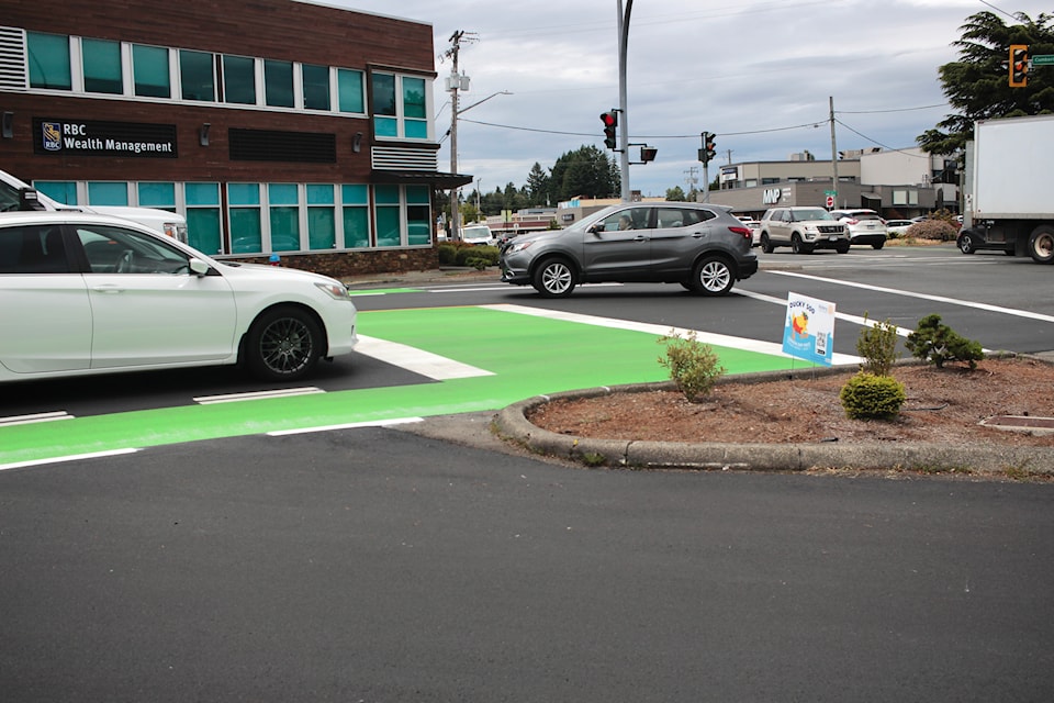 New green boxes painted on Cumberland Road and Fitzgerald Avenue in Courtenay.