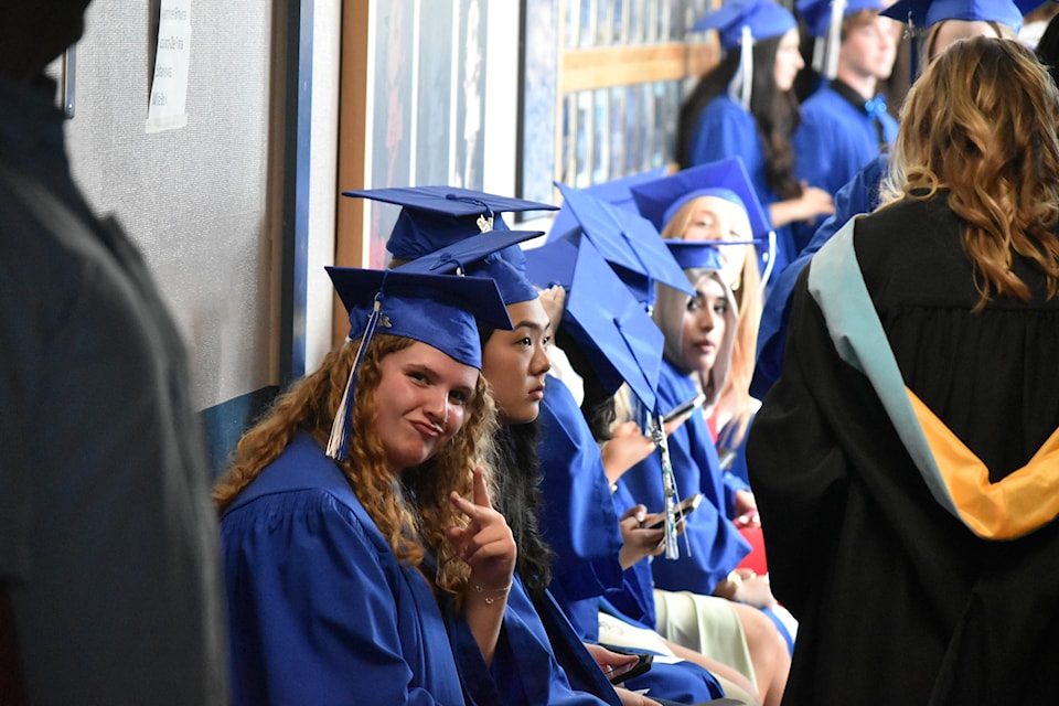 Students were excitedly waiting in the wings before the ceremony.