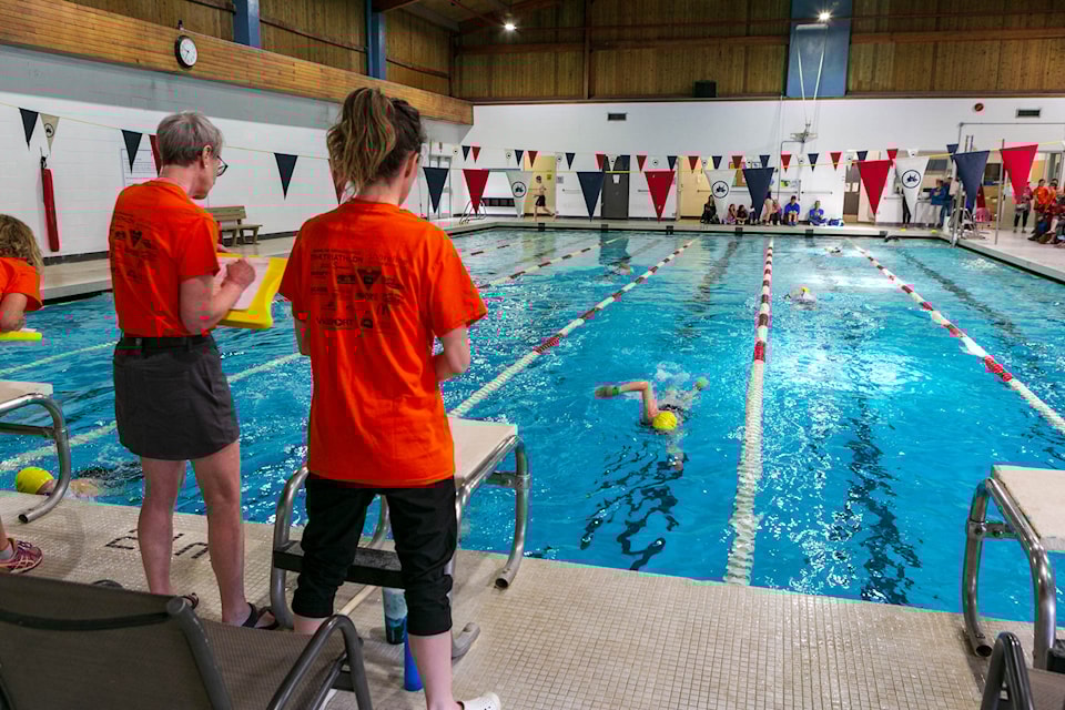 The race starts in the pool with a swimming leg. 