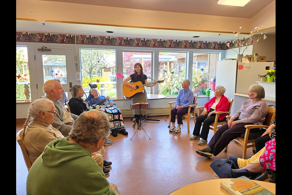 Parsons runs a music therapy group for several residents. 