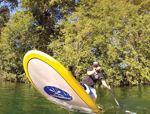 Stuart Robinson from Compass Adventures does some fancy stand-up paddling.