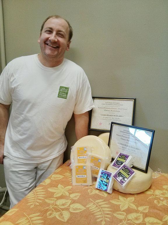 Natural Pastures master cheesemaker Paul Sutter with his award-winning cheeses.