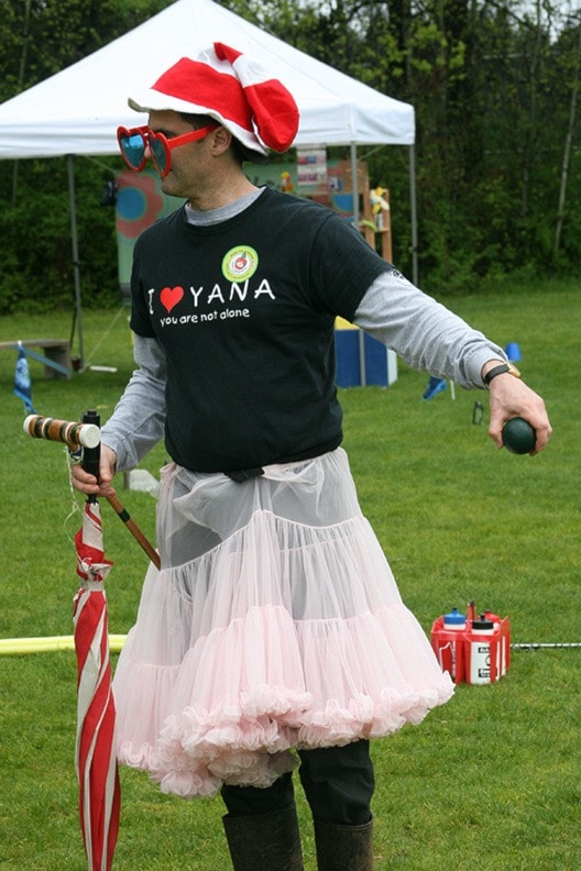 A member of the YANA team is resplendent in his tutu and Dr. Suess hat.