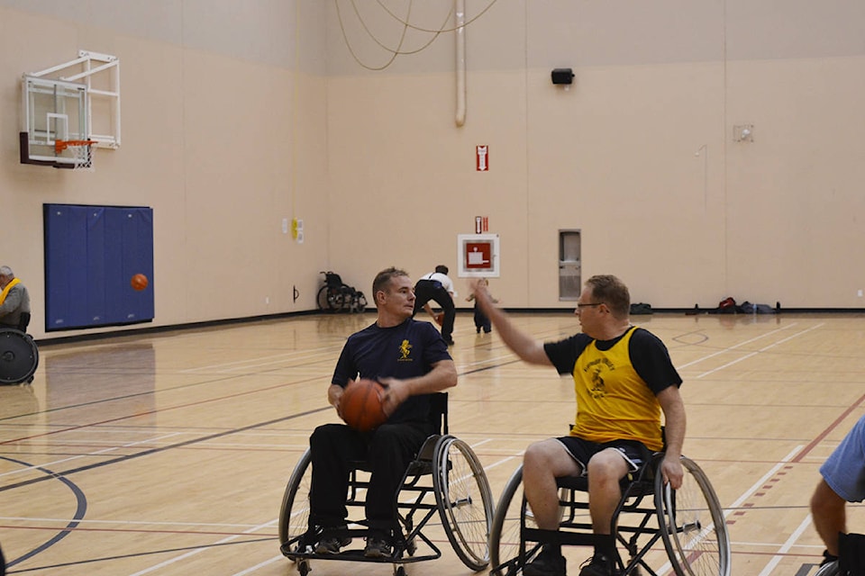 9036861_web1_171026-CVR-S-WheelchairBasketball2