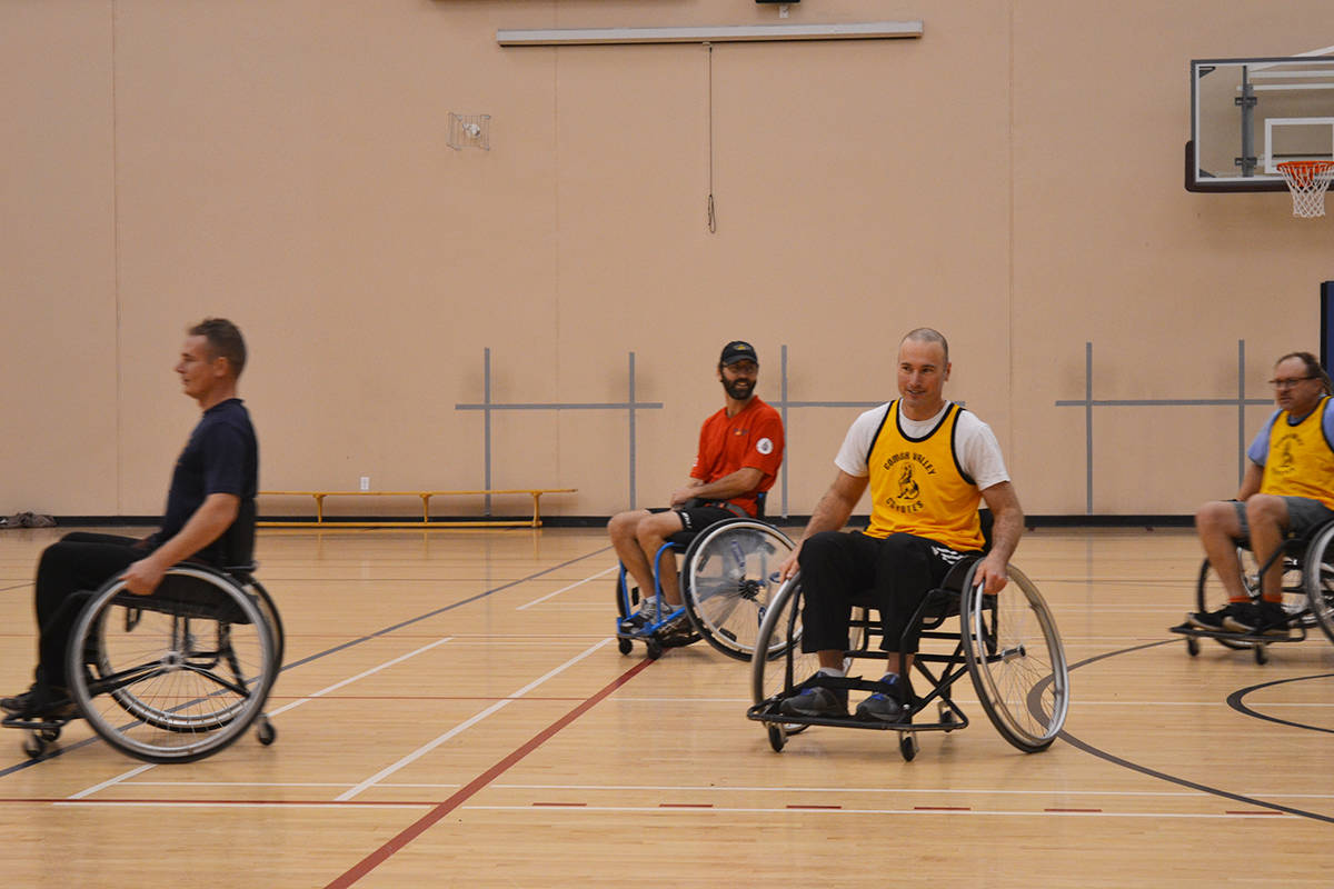 9036861_web1_171026-CVR-S-WheelchairBasketball4