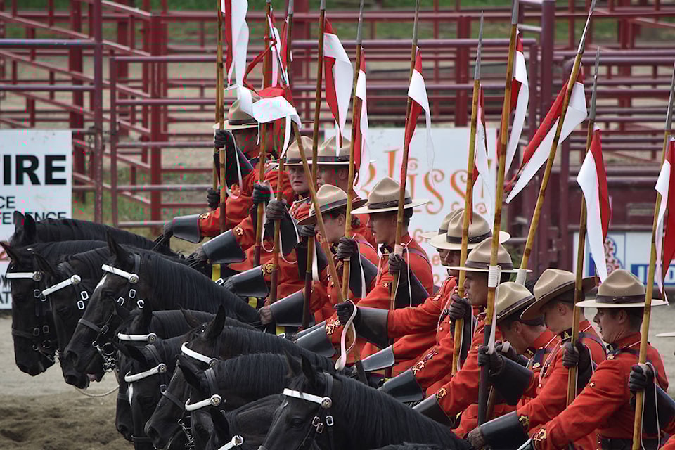 13249092_web1_180803-QCO-Musical-Ride-1