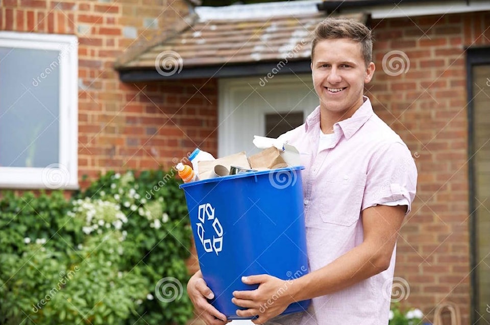 13315900_web1_180828-CVR-M-portrait-man-carrying-recycling-bin-outdoors-55691697