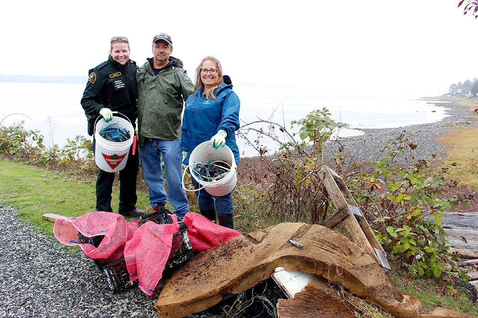 13627460_web1_copy_180919-CVR-N-beach-cleanup