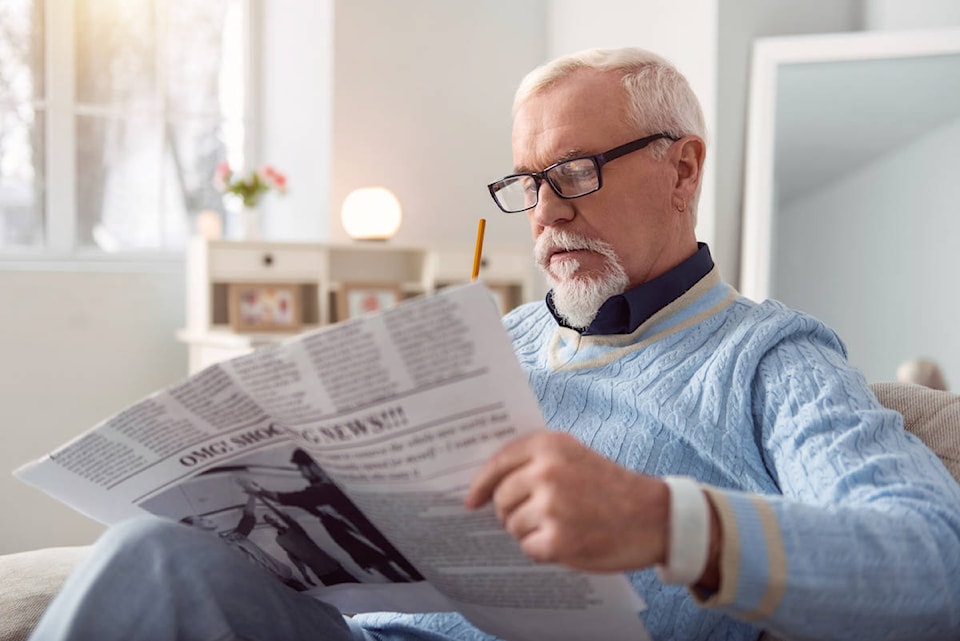 13785211_web1_man-and-paper