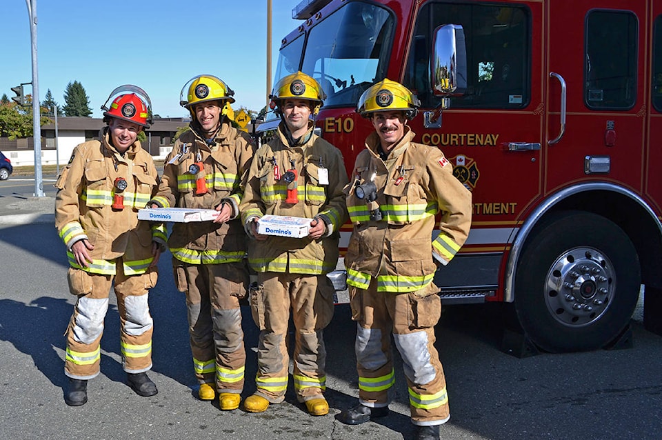 13808731_web1_181004-CVR-C-Firefighterspizza