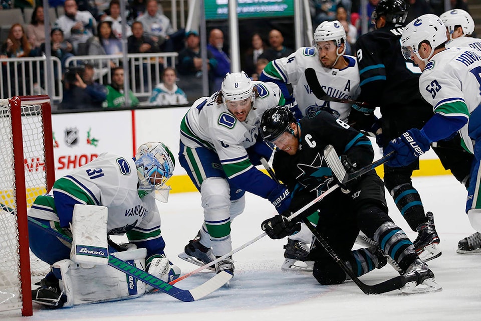 14525181_web1_181123-IFD-Canucks-Sharks