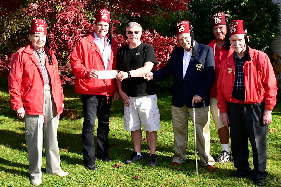 14647556_web1_181115-cvr-gb-Shriners