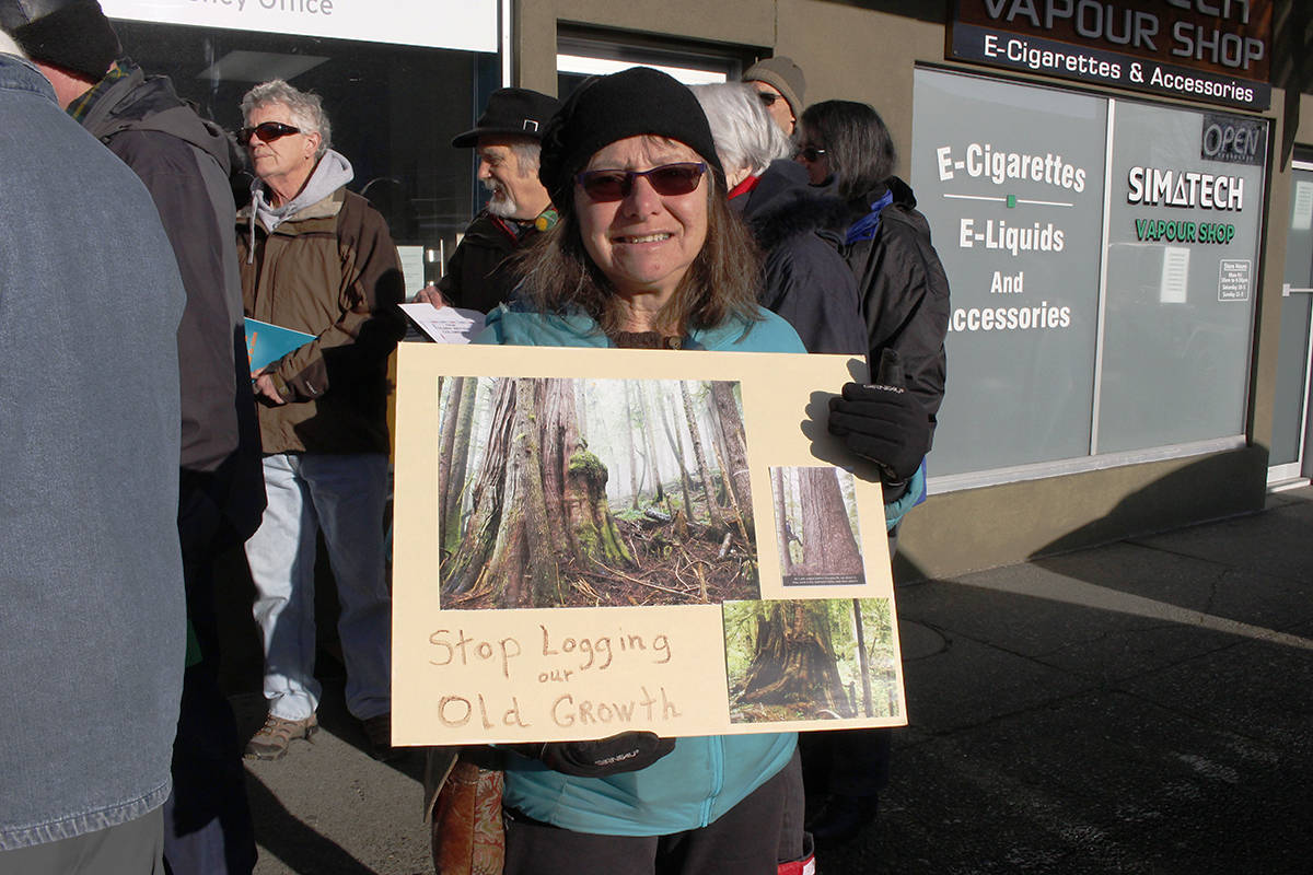 15444076_web1_190206-CVR-N-old-growth-protest-person