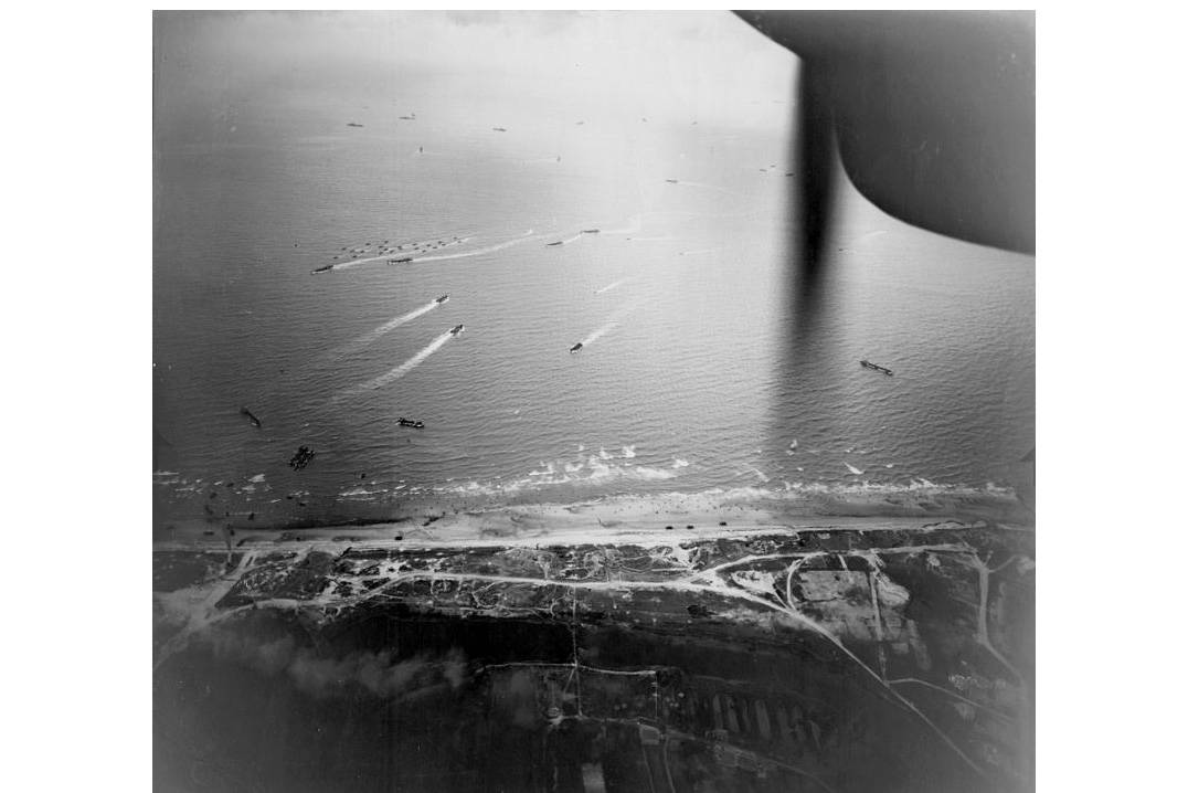 17058129_web1_190606-CVR-C-photo_of_Normandy_invasion_coast_1944